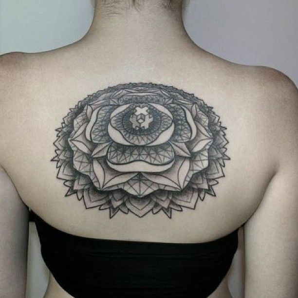 Women back tattoo by Chaim Machlev