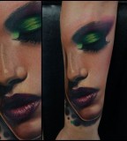 Women tattoo by Rich Pineda