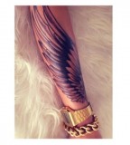 Wonderful wings tattoo