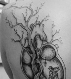 alex tabuns heart tree tattoo