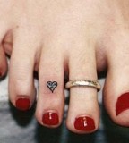 beautiful tattoo placement tiny heart on toe
