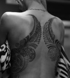 beautiful tattoo placement tribal back piece