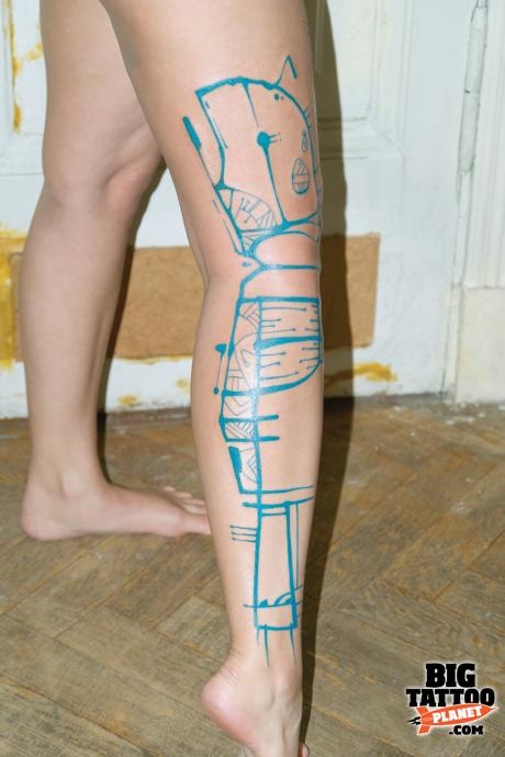 blue ink tattoo abstract leg work