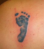 blue ink tattoo baby foot