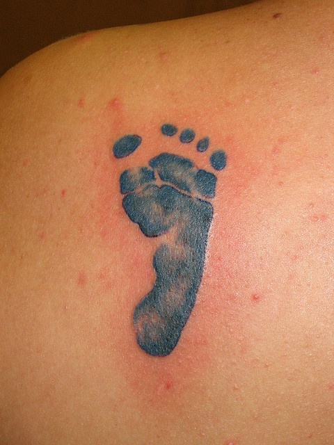 blue ink tattoo baby foot