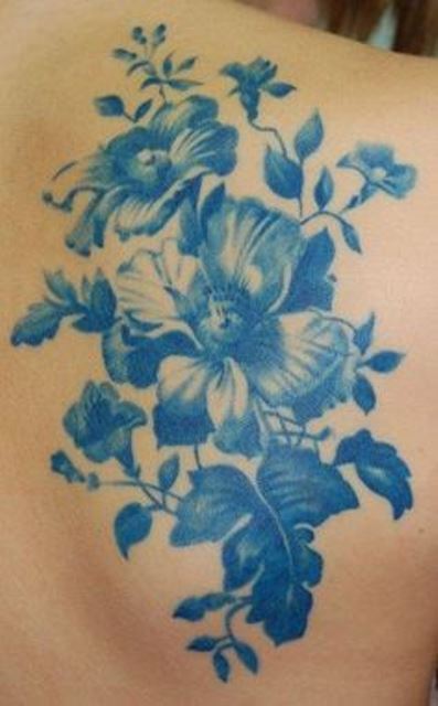 blue ink tattoo flowers
