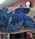 blue ink tattoo rooster