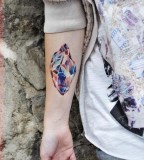 crystal tattoo colour piece on inside arm