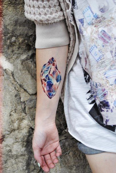 crystal tattoo colour piece on inside arm