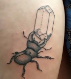 crystal tattoo with bug
