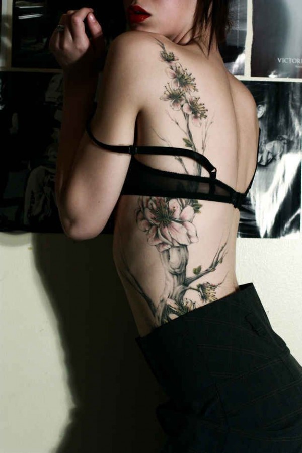 floral back and ribs tattoo for girl