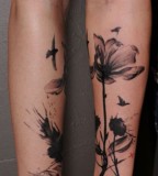 flower and birds watercolor blackwork tattoo