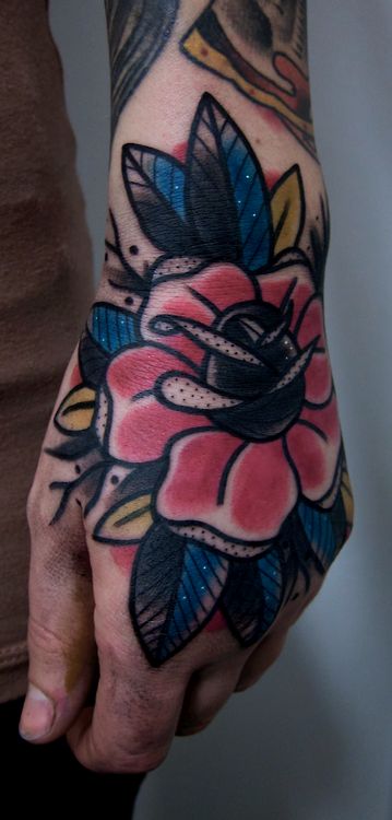 flower tattoo mans hand