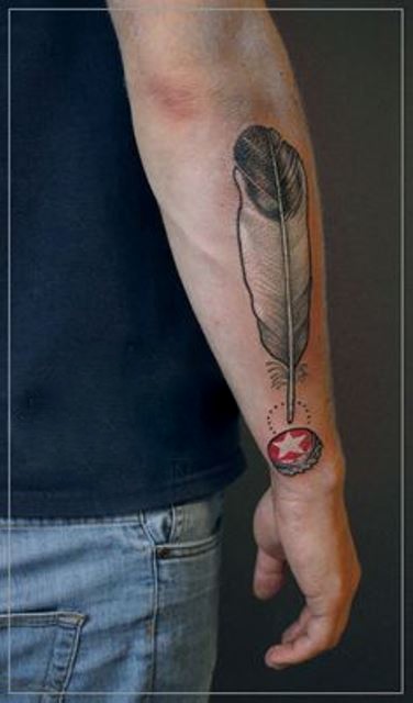jessica mach tattoo feather on arm
