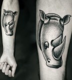 kamil czapiga tattoo rhino head on arm