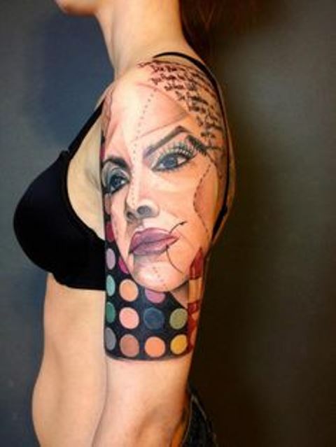 marie kraus tattoo upper arm sleeve with woman’s face