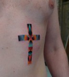 mariusz trubisz cross tattoo