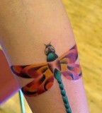 mariusz trubisz dragon-fly tattoo