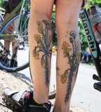 nature tattoo dandelion on legs