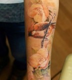 nature tattoo pastel flowers and bird piece