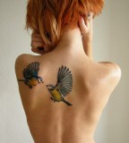 nature tattoo red haired girl with birds  on back