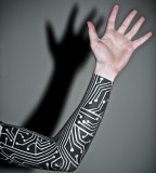 robots tattoo on arm