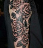 rose tatto on shoulde