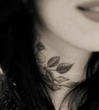 roses tattoo on neck