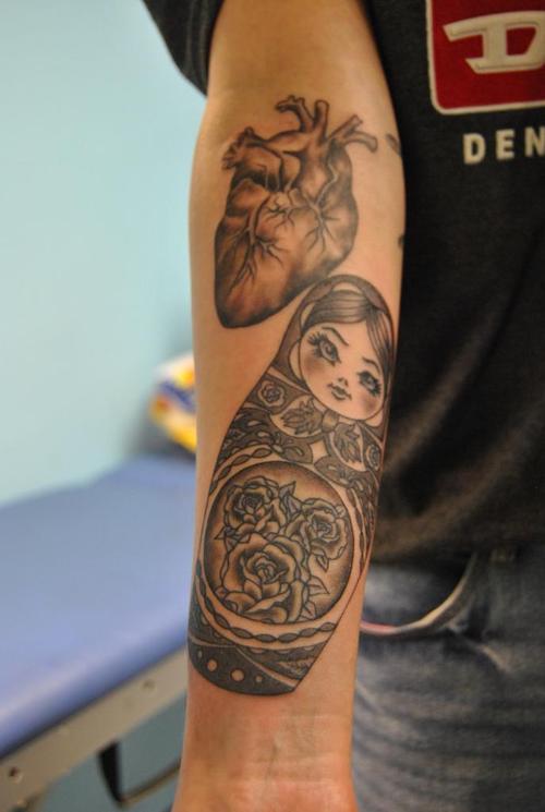 russian doll tattoo matryoshka and heart on arm
