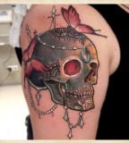 skull and flowers tattoo