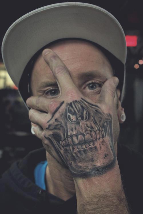 skull tattoo on face