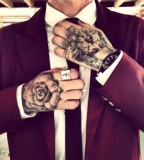 tattoos for men classy man with hand tattoos