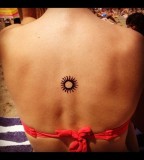 Adorable sun tattoo