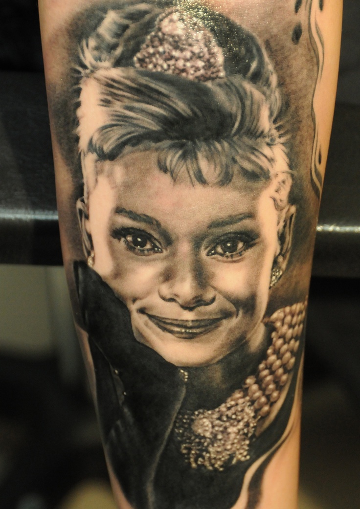 Amaizing woman tattoo by Andy Engel