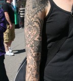 Arm lace tattoo