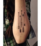 Arrow geometrical tattoo