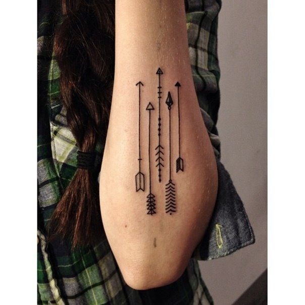 Arrow geometrical tattoo