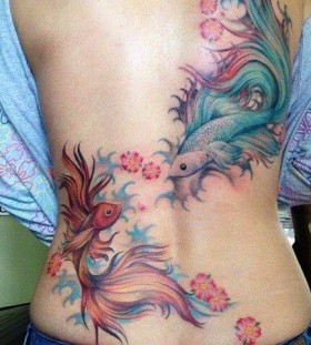 Awesome back fishes tattoo