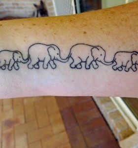 Awesome elephants tattoo