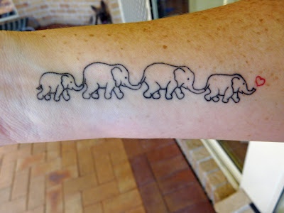 Awesome elephants tattoo