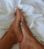Awesome foot sun tattoo