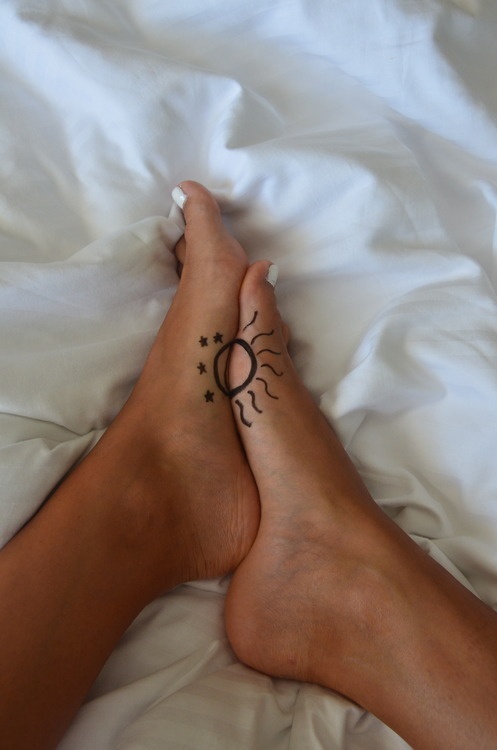 Awesome foot sun tattoo