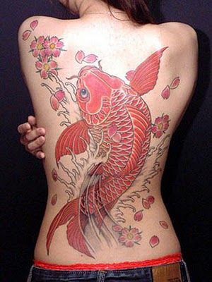 Awesome red fish tattoo