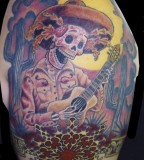 Awesome skull tattoo by Michael Norris