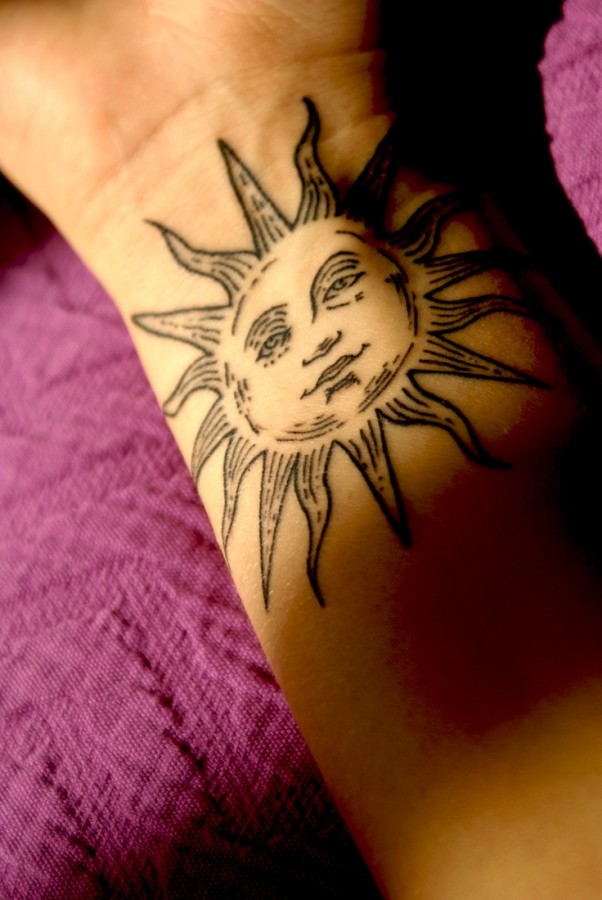 Awesome sun tattoo