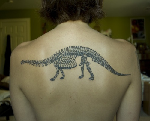 Back dinosaur tattoo