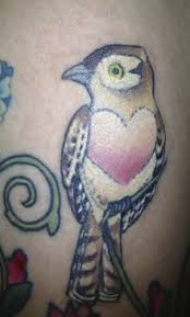 Bird tattoo by Michael Norris