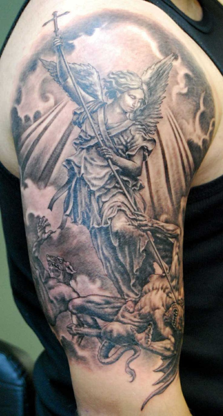 Black and white religious tattoo