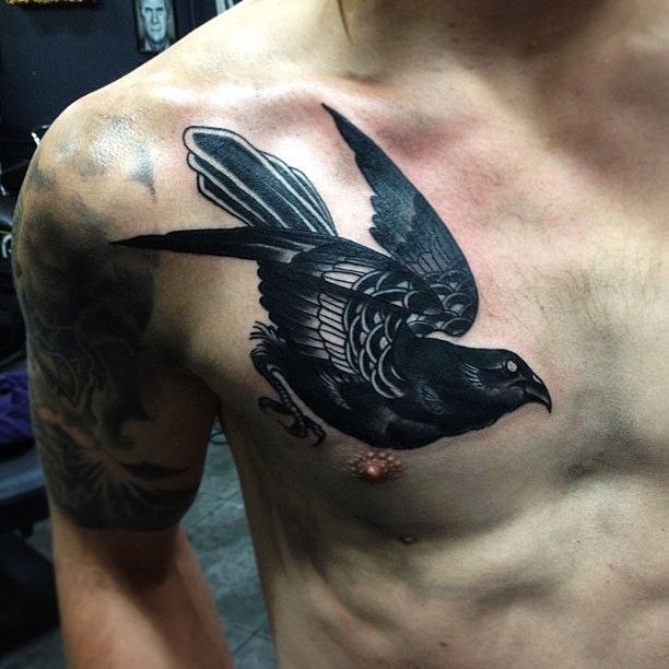 Black bird tattoo by Pari Corbitt