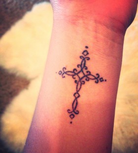 Black cross religious tattoo